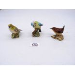 Three Beswick birds including Wren, Gold Crest and Blue Tit, all 2 1/2" tall approx.