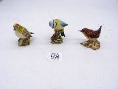 Three Beswick birds including Wren, Gold Crest and Blue Tit, all 2 1/2" tall approx.