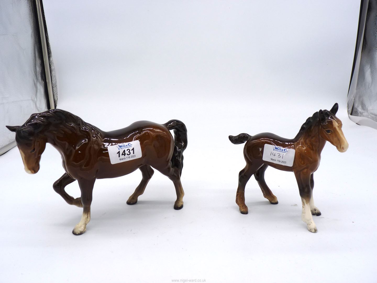 A Beswick Horse and Foal, both with leg repairs, tallest 6" high.