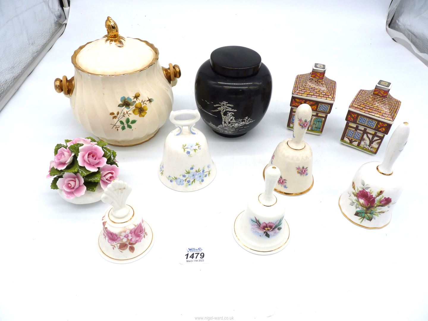 A quantity of china including bells, ginger jar, biscuit barrel etc.