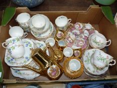 A quantity of part/full tea/coffee sets including gold coloured coffee set,