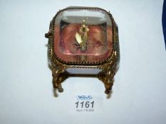 A late 19th century Palais Royale type miniature cut glass and gilt brass dressing table vitrine,