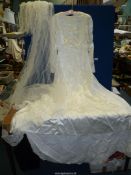 A 1950's/60's white satin Wedding Dress with train and veil.