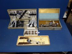 A quantity of cutlery including a boxed carving set, boxed set of four napkin rings, cased set,
