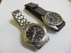 A Pulsar Quartz Military style wristwatch having a date window at the 3 o'clock position and a