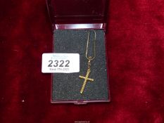 A 375 gold crucifix and chain.