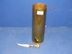 A brass Shell case 1942 and dagger.