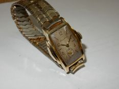 A Bulova rectangular faced wristwatch of Art Deco design having Arabic numerals/baton hour markers