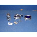 A silver Cruet, mustard and salt spoons, with blue glass liners, Sheffield 1929,