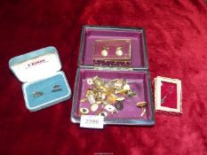 A quantity of cufflinks including one pair stamped silver, boxed Stratton,