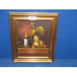 A small still life oil on canvas of fruit and a candle on a table, signed lower right Austen,