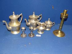 A silver plated Tea and Coffee set, brass candlesticks etc.