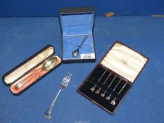 A small quantity of mostly cased silver cutlery including a set of five Cocktail sticks with