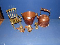 A small quantity of brass and copper including a large brass rocking chair,