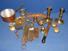 A small quantity of brass including a pair of candlesticks, spring balances, pair of inkwells,
