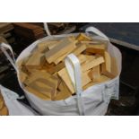 A builder's bag of softwood offcuts.