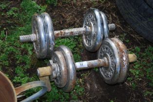 Two Olympus weights.