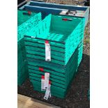 Twelve green crates.