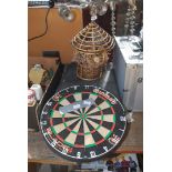 Dart board, rubber runner for Darts game and a planter.