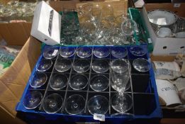Two boxes of wine glasses.