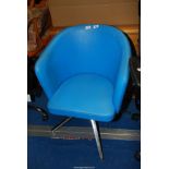 Bright blue office chair, tub style (swivels).