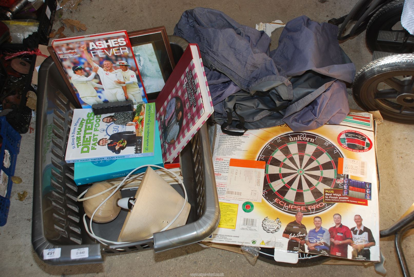 Dartboard (as new), seat covers, books incl. sports, Hairy Bikers, Slow cooker etc.