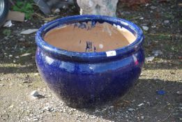 Blue glazed planter, 18'' diameter x 11'' high.