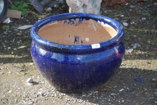 Blue glazed planter, 18'' diameter x 11'' high.
