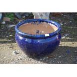 Blue glazed planter, 18'' diameter x 11'' high.