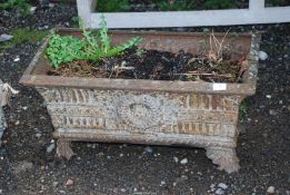 Cast iron rectangular Planter with central wreath design to front and fluted details,