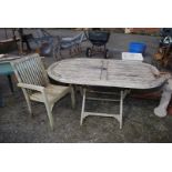 Oval wooden table (a/f) 60'' long x 35 1/2'' deep x 29'' high plus one chair.