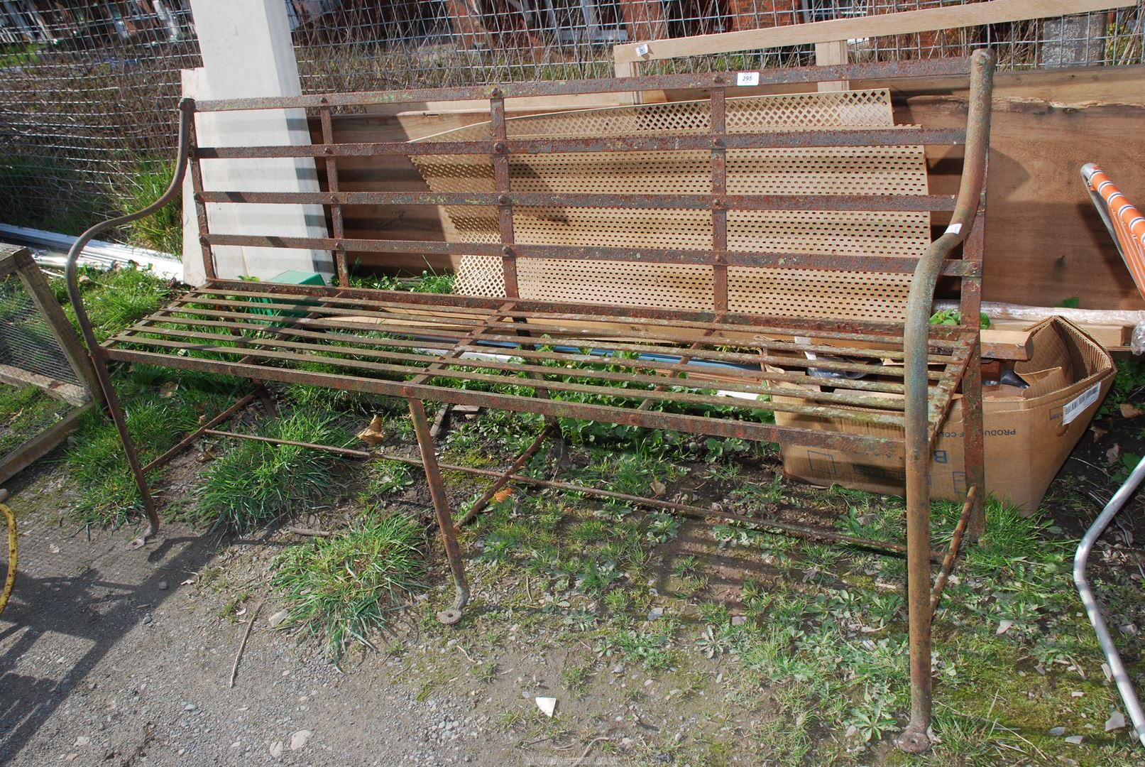 Metal bench, 6' wide x 35" high.