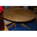 Solid circular pine pedestal dining table, 5' diameter x 30" high.