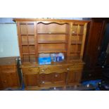 Pine dresser with 2 glass display cupboards, shelves, drawers and lower cupboards,