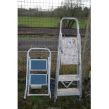 Three rung metal stepladder and two step stepper.