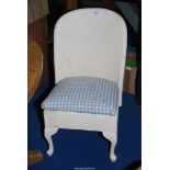 Lloyd Loom style seat with storage.