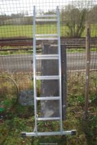 Seven rung Aluminium ladder with a platform walkway.
