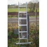 Seven rung Aluminium ladder with a platform walkway.