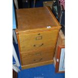 Two drawer wooden filing cabinet.
