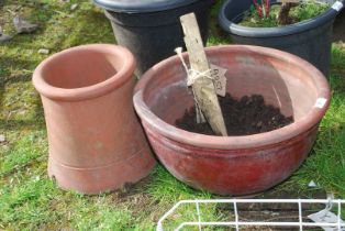 Chimney pot and terracotta planter.