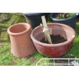 Chimney pot and terracotta planter.