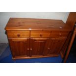 Pine sideboard with cupboards and drawers, 46" x 18" x 33 1/2" high.