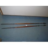 Two Tribal spears with forged spear head and carved wooden handles.