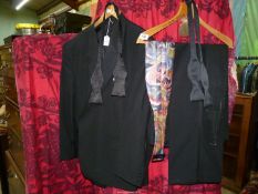 A gent's Sergio Rossi Evening suit, UK 50 with two cummerbunds and two bow ties.