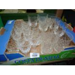 A quantity of crystal cut glasses including wine and sherry.