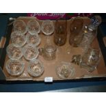 A quantity of glass including decanter, set of nine matching wine glasses, inkwells,