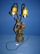 A contemporary art nouveau style Lamp with two maidens and two glass shades, 26" tall.