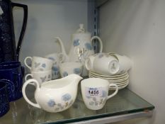 A Wedgwood 'Ice Rose' coffee set for six, with extra cups and saucers.
