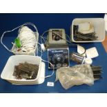 A quantity of model railway electrical components including wires, two power control units,