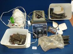 A quantity of model railway electrical components including wires, two power control units,
